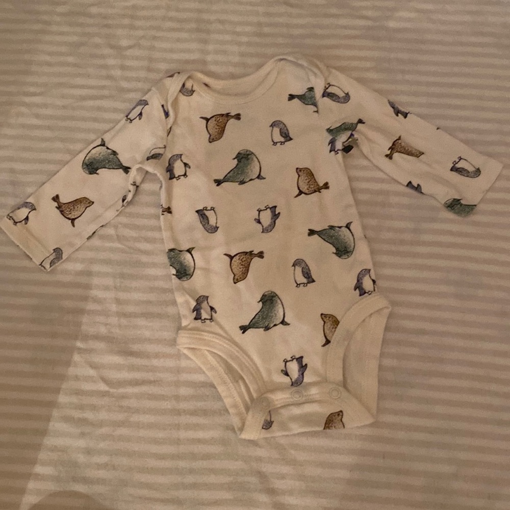 Seals unisex onesie.